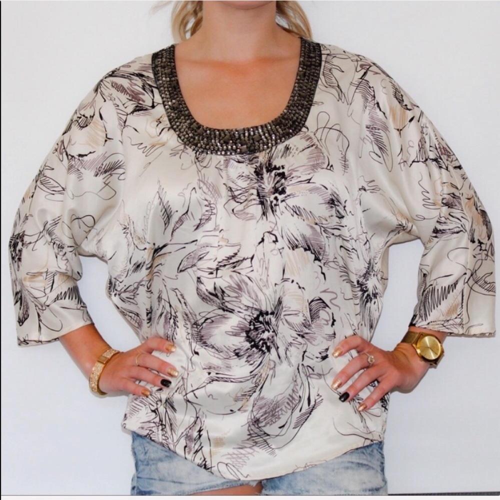 Embellished Yvos blouse has a floral design